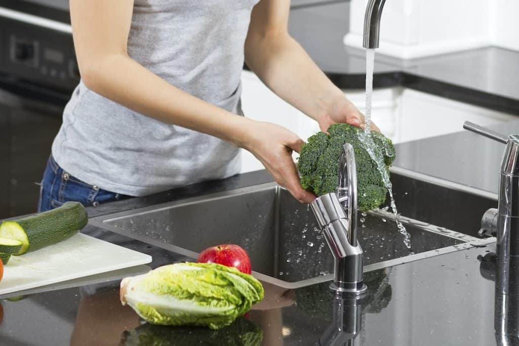 Hygiene in kitchen includes washing vegetables and fruit, safe food prep
